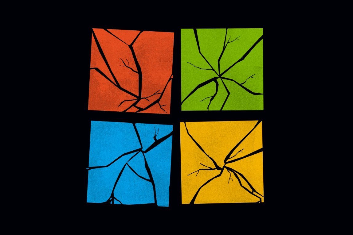A Microsoft logo with cracks running through each of the colored panes in the window shape.